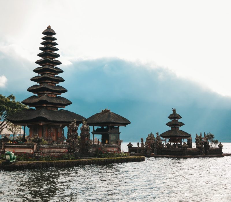 Pura Ulun Danu Bratan, Bali. Hindu temple surrounded by flowers on Bratan lake